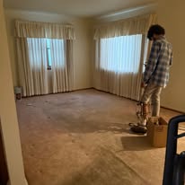 Ranch living room and bedrooms — cleanout photo