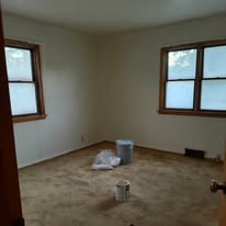 Ranch living room and bedrooms — cleanout photo