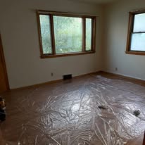 Ranch living room and bedrooms — cleanout photo