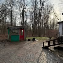 Wooded property, outbuildings cleared — cleanout photo