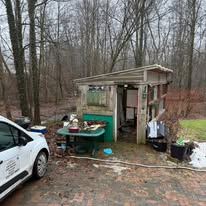 Wooded property, outbuildings cleared — cleanout photo